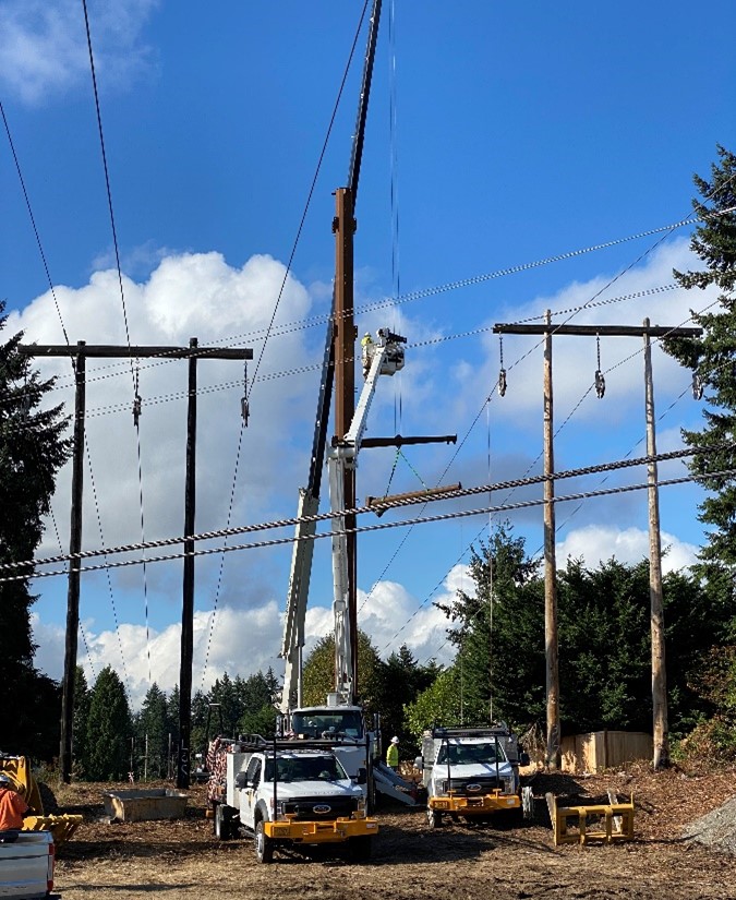 Crews construct the first pole of the Energize Eastside 230 kV transmission line in Renton